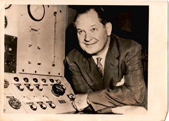 Portrait of Dr. T. Keith Glennan in Technology laboratory