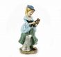 Vintage Porcelain Sculpture of Lady with dog