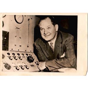 Portrait of Dr. T. Keith Glennan in Technology laboratory