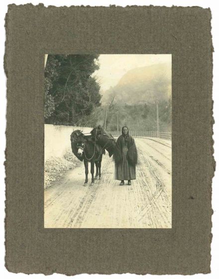The Old Days - Woman on the Snowy Road
