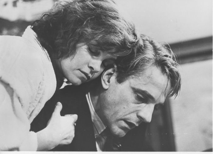 Geneviève Bujold and Jeremy Irons