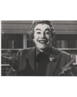 Cesar Romero as "The Joker"