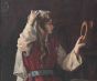 A Young Oriental Woman Looking in the Mirror 